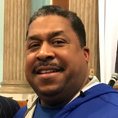 Coach Lloyd 'Louie' Carter